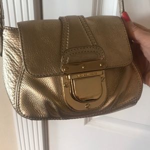 Michael Kors gold shoulder bag with strap